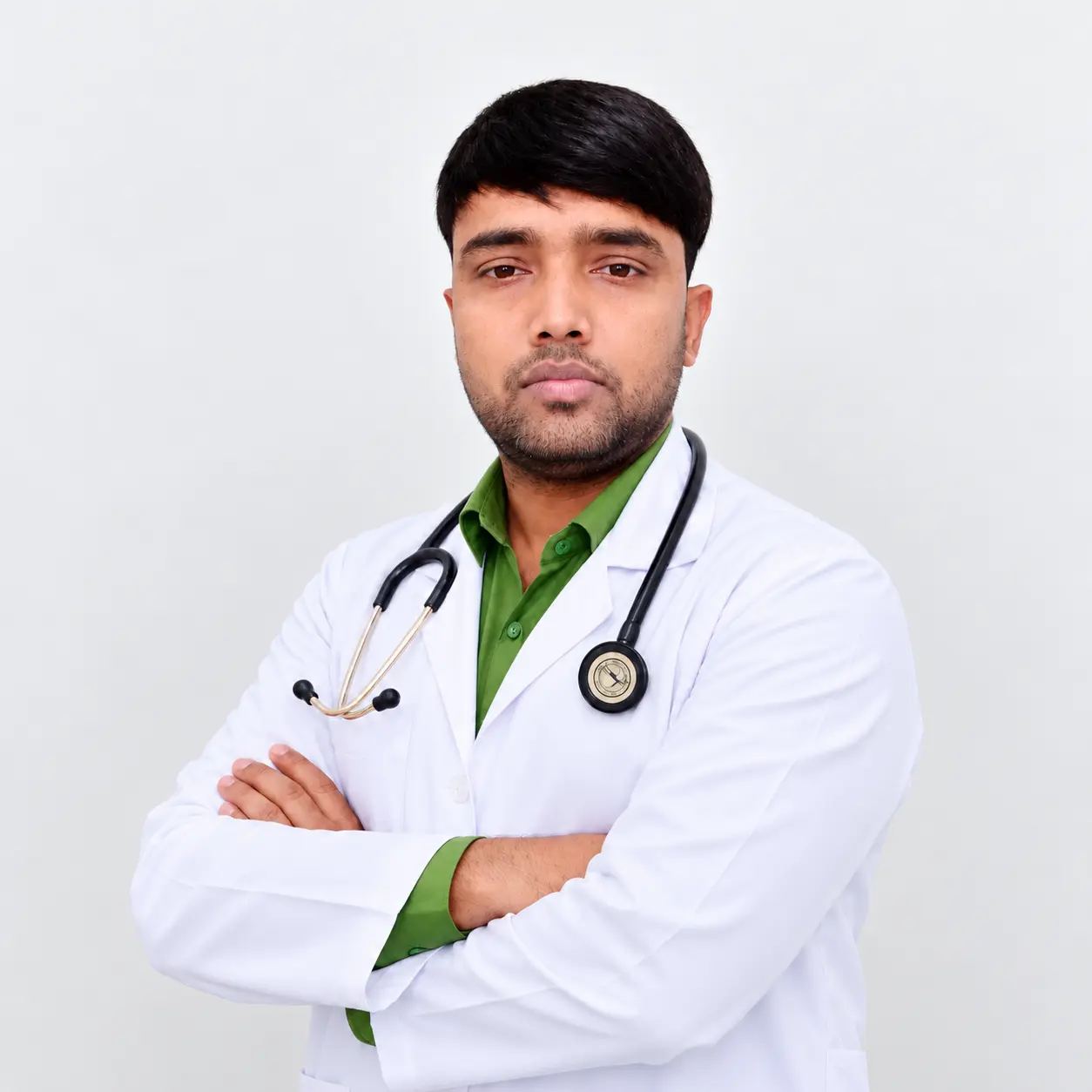 Indian doctor in a white coat with a stethoscope